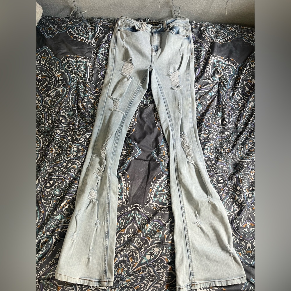 High waisted distressed flare jeans
